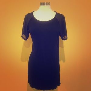 Black top with side slits and sheer sleeves